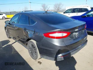 2015 Ford Fusion S Hybrid with VIN 3FA6P0UU2FR105754, listed as a IAAI auction lot 41631104 with 185,114 mi miles. Bid and sale history available at carsss.com. Image 6.