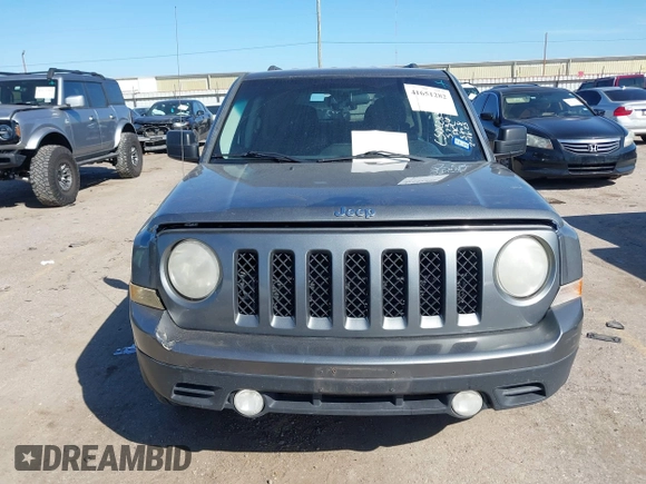 2013 Jeep Patriot Sport with VIN 1C4NJPBA0DD245736, listed as a IAAI auction lot 41651282 with 227,456 mi miles. Bid and sale history available at carsss.com. Image 12.