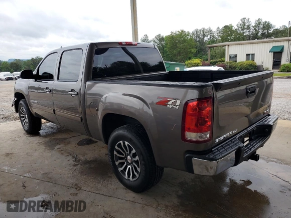 2012 GMC Sierra 1500 SLT with VIN 3GTP2WE74CG310914, listed as a Copart auction lot 56049905 with 106,882 mi miles and Salvage title. Bid and sale history available at DreamBid. Image 2.