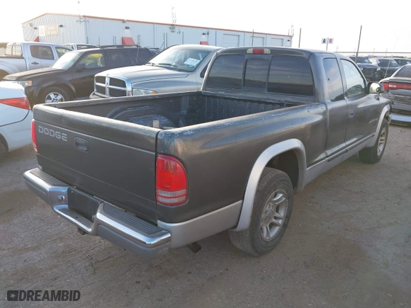2002 Dodge Dakota SLT with VIN 1B7GL42X42S682184, listed as a IAAI auction lot 41784688 with 168,298 mi miles. Bid and sale history available at carsss.com. Image 4.