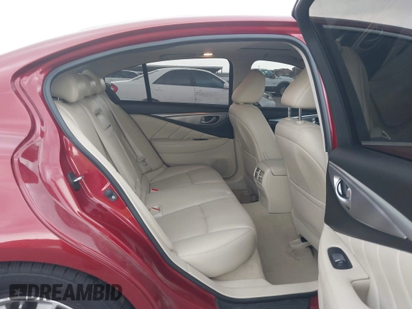 2014 Infiniti Q50 Premium z VIN JN1BV7AP8EM673359, wystawiony jako IAAI lot #42300427 z przebiegiem 118 779 mil mil oraz . Historia ofert i sprzedaży dostępna na DreamBid. Obrazek 8.