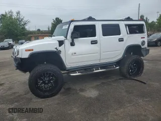 2006 Hummer H2 z VIN 5GRGN23U66H116337, wystawiony jako Copart lot #57806325 z przebiegiem Nie podano mil oraz Szkoda całkowita • Salvage title. Historia ofert i sprzedaży dostępna na DreamBid. Obrazek 1.