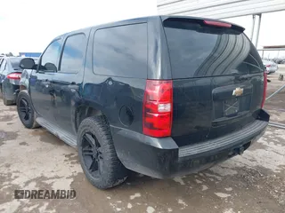 2011 Chevrolet Tahoe Commercial with VIN 1GNLC2E00BR325388, listed as a IAAI auction lot 41472731 with 265,781 mi miles and . Bid and sale history available at DreamBid. Image 3.