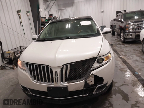 2011 Lincoln MKX with VIN 2LMDJ8JKXBBJ34612, listed as a IAAI auction lot 41775743 with 137,810 mi miles and . Bid and sale history available at DreamBid. Image 12.