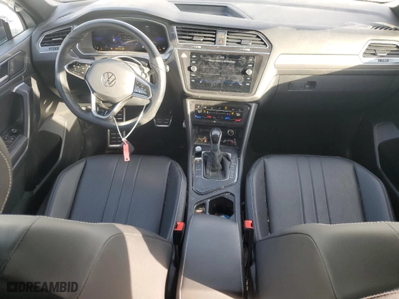 2023 Volkswagen Tiguan SE R-Line Black with VIN 3VVCB7AX8PM121086, listed as a Copart auction lot 45601555 with 27,571 mi miles and Salvage Title. Bid and sale history available at carsss.com. Image 8.