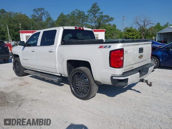 2017 Chevrolet Silverado 1500 LT with VIN 3GCUKREC4HG364108, listed as a IAAI auction lot 42050014 with 148,691 mi miles and . Bid and sale history available at DreamBid. Image 3.