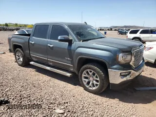 2018 GMC Sierra 1500 SLT with VIN 3GTP1NEC5JG561321, listed as a Copart auction lot 51986515 with 133,751 mi miles and Clean title. Bid and sale history available at DreamBid. Image 4.