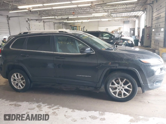 2015 Jeep Cherokee Latitude с VIN 1C4PJMCS6FW792306, выставлен на аукционе IAAI как лот 42311276 с пробегом 162 791 миль миль и . История ставок и продаж доступна на DreamBid. Изображение 13.