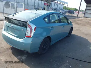 2014 Toyota Prius Four with VIN JTDKN3DUXE1852835, listed as a IAAI auction lot 42234128 with 189,512 mi miles and . Bid and sale history available at DreamBid. Image 4.