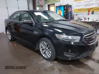 2014 Ford Taurus Limited z VIN 1FAHP2F84EG179381, wystawiony jako IAAI lot #41907833 z przebiegiem 135 776 mil mil oraz . Historia ofert i sprzedaży dostępna na DreamBid. Obrazek 1.