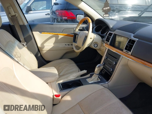 2012 Lincoln MKZ with VIN 3LNHL2GC4CR802198, listed as a IAAI auction lot 41703450 with 107,397 mi miles. Bid and sale history available at carsss.com. Image 5.