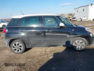 2014 FIAT 500L Easy with VIN ZFBCFABH1EZ002527, listed as a IAAI auction lot 41451693 with 133,488 mi miles and . Bid and sale history available at DreamBid. Image 13.