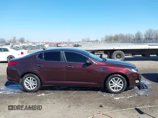 2013 Kia Optima LX z VIN 5XXGM4A7XDG241462, wystawiony jako IAAI lot #41774969 z przebiegiem 151 819 mil mil oraz . Historia ofert i sprzedaży dostępna na DreamBid. Obrazek 13.