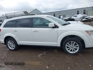 2017 Dodge Journey SXT z VIN 3C4PDCBG4HT531635, wystawiony jako IAAI lot #42460200 z przebiegiem 152 293 mil mil oraz . Historia ofert i sprzedaży dostępna na DreamBid. Obrazek 13.