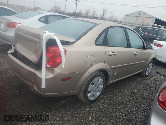2008 Suzuki Forenza z VIN KL5JD56Z08K908143, wystawiony jako Copart lot #42985685 z przebiegiem 57 435 mil mil oraz Szkoda całkowita • Salvage title. Historia ofert i sprzedaży dostępna na DreamBid. Obrazek 3.