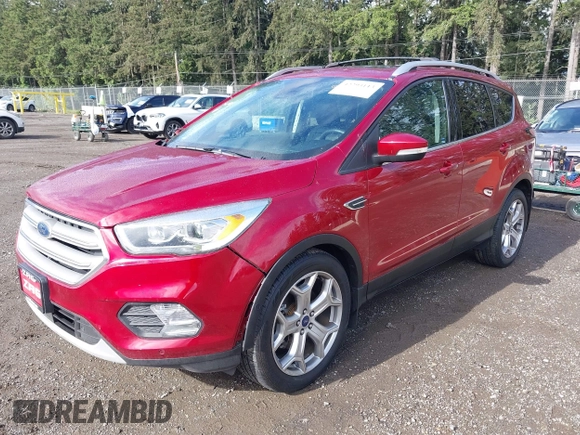 2018 Ford Escape Titanium with VIN 1FMCU9J99JUB44963, listed as a IAAI auction lot 42293113 with 68,803 mi miles and . Bid and sale history available at DreamBid. Image 18.