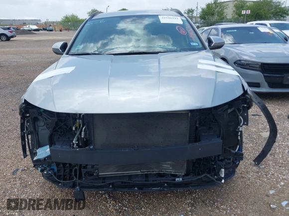 2022 Hyundai Tucson SEL with VIN 5NMJB3AE9NH139738, listed as a IAAI auction lot 41948244 with 31,990 mi miles and . Bid and sale history available at DreamBid. Image 6.