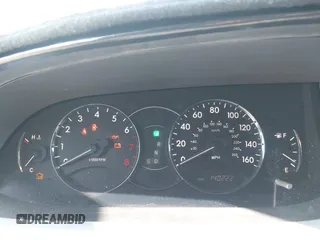 2005 Toyota Avalon XL z VIN 4T1BK36B95U050498, wystawiony jako IAAI lot #42220560 z przebiegiem 140 222 mil mil oraz . Historia ofert i sprzedaży dostępna na DreamBid. Obrazek 7.