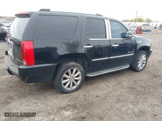 2009 Cadillac Escalade with VIN 1GYFK23219R102455, listed as a IAAI auction lot 42094042 with 238,407 mi miles. Bid and sale history available at carsss.com. Image 4.