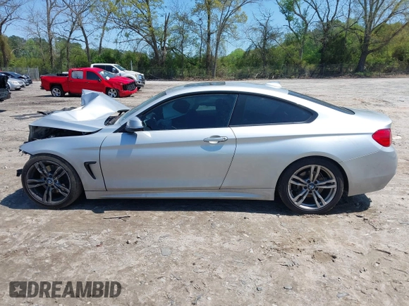 2014 BMW 4 Series 428i with VIN WBA3N7C50EK220438, listed as a IAAI auction lot 41990873 with 141,736 mi miles and . Bid and sale history available at carsss.com. Image 14.