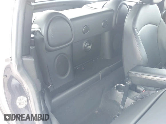 2013 MINI Coupe S with VIN WMWSX3C50DT466882, listed as a IAAI auction lot 42026938 with 99,499 mi miles and . Bid and sale history available at DreamBid. Image 8.