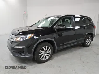 2021 Honda Pilot EX-L with VIN 5FNYF6H52MB054430, listed as a Copart auction lot 61856825 with 118,915 mi miles and Clean title. Bid and sale history available at DreamBid. Image 1.