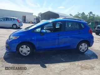 2020 Honda Fit LX z VIN 3HGGK5H43LM703494, wystawiony jako IAAI lot #42308518 z przebiegiem 67 452 mil mil oraz . Historia ofert i sprzedaży dostępna na DreamBid. Obrazek 14.
