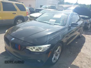 2014 BMW 4 Series 428i xDrive with VIN WBA3N5C52EF716998, listed as a IAAI auction lot 42548467 with 212,418 mi miles and . Bid and sale history available at DreamBid. Image 2.