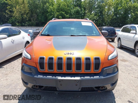 2016 Jeep Cherokee Trailhawk with VIN 1C4PJMBS6GW318035, listed as a IAAI auction lot 42652034 with 187,519 mi miles and . Bid and sale history available at DreamBid. Image 12.