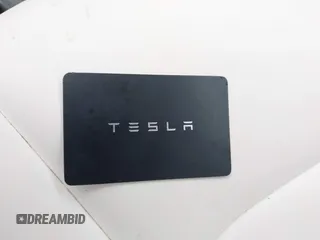 2023 Tesla Model Y Long Range with VIN 7SAYGDEE1PA169031, listed as a IAAI auction lot 41660766 with 35,253 mi miles and . Bid and sale history available at DreamBid. Image 11.