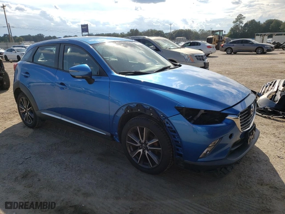 2016 Mazda CX-3 Grand Touring with VIN JM1DKDD74G0132201, listed as a Copart auction lot 73273264 with 83,176 mi miles and Salvage Title. Bid and sale history available at carsss.com. Image 4.