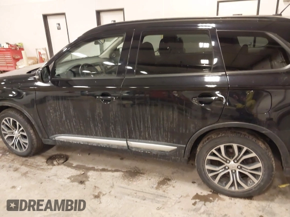 2016 Mitsubishi Outlander SE with VIN JA4AZ3A35GZ037422, listed as a IAAI auction lot 41504909 with 115,242 mi miles and . Bid and sale history available at DreamBid. Image 14.