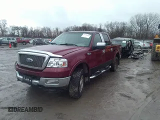 2005 Ford F-150 XLT with VIN 1FTPW14565KE49963, listed as a IAAI auction lot 41709433 with 202,322 mi miles. Bid and sale history available at carsss.com. Image 2.