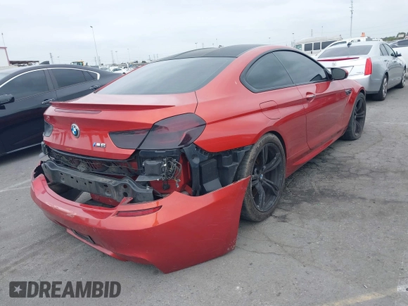 2013 BMW M6 z VIN WBSLX9C55DC968497, wystawiony jako IAAI lot #41863884 z przebiegiem 128 241 mil mil oraz . Historia ofert i sprzedaży dostępna na DreamBid. Obrazek 4.