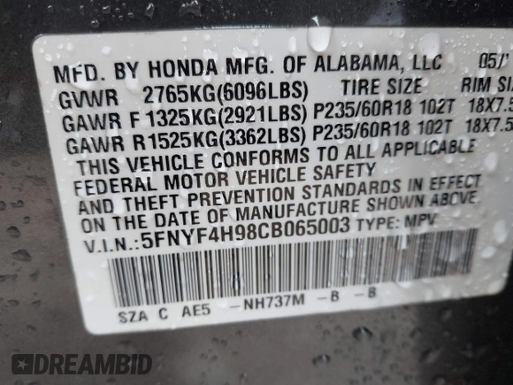 2012 Honda Pilot Touring with VIN 5FNYF4H98CB065003, listed as a IAAI auction lot 41989829 with 91,607 mi miles and . Bid and sale history available at DreamBid. Image 9.