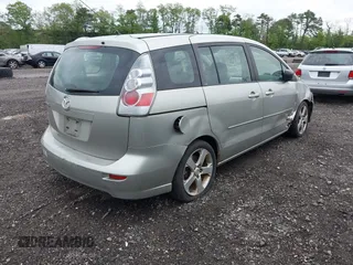 2007 Mazda 5 Touring with VIN JM1CR29L570158291, listed as a IAAI auction lot 42267447 with Not provided miles and . Bid and sale history available at DreamBid. Image 4.