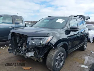 2022 Honda Passport TrailSport z VIN 5FNYF8H60NB011632, wystawiony jako IAAI lot #41779705 z przebiegiem 42 038 mil mil oraz . Historia ofert i sprzedaży dostępna na DreamBid. Obrazek 2.