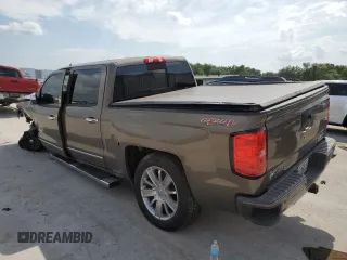 2014 Chevrolet Silverado 1500 High Country with VIN 3GCUKTEC6EG438556, listed as a Copart auction lot 54818993 with 91,398 mi miles and Salvage Title. Bid and sale history available at DreamBid. Image 2.