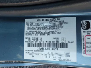 2011 Ford Fusion SEL with VIN 3FAHP0JG9BR131298, listed as a IAAI auction lot 41747976 with 169,000 mi miles. Bid and sale history available at carsss.com. Image 9.