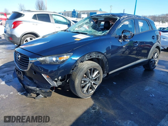 2017 Mazda CX-3 Touring with VIN JM1DKFC75H0157610, listed as a IAAI auction lot 41326591 with 51,291 mi miles. Bid and sale history available at carsss.com. Image 2.