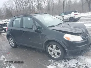 2012 Suzuki SX4 Crossover with VIN JS2YB5A36C6303021, listed as a IAAI auction lot 41446779 with 94,469 mi miles. Bid and sale history available at carsss.com. Image 13.