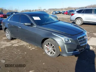 2014 Cadillac CTS AWD z VIN 1G6AW5SXXE0157264, wystawiony jako IAAI lot #41816405 z przebiegiem 177 008 mil mil oraz . Historia ofert i sprzedaży dostępna na DreamBid. Obrazek 1.