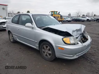 2005 Hyundai Accent GLS with VIN KMHCG35C25U359293, listed as a IAAI auction lot 41233474 with 148,344 mi miles. Bid and sale history available at carsss.com. Image 1.