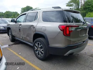 2023 GMC Acadia SLT with VIN 1GKKNUL41PZ184357, listed as a IAAI auction lot 42439400 with 60,238 mi miles and . Bid and sale history available at DreamBid. Image 3.