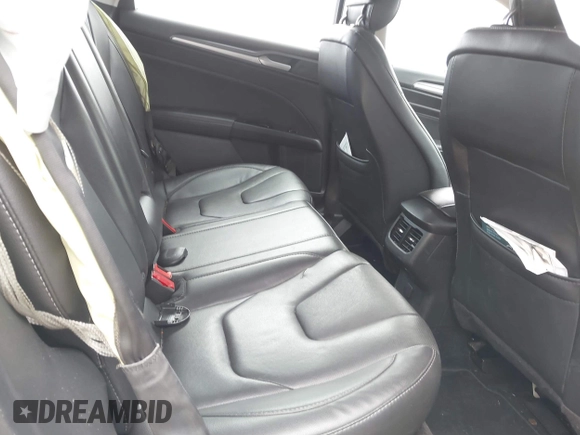 2014 Ford Fusion Titanium with VIN 3FA6P0K92ER355539, listed as a IAAI auction lot 41851471 with 178,176 mi miles and . Bid and sale history available at DreamBid. Image 8.
