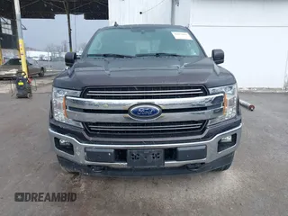 2019 Ford F-150 XL with VIN 1FTFW1E13KFC63843, listed as a IAAI auction lot 41682862 with 102,390 mi miles. Bid and sale history available at carsss.com. Image 13.