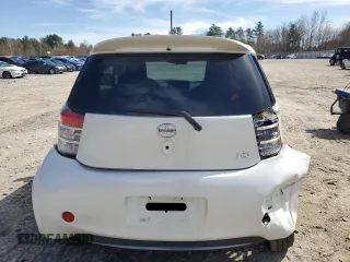 2012 Scion iQ with VIN JTNJJXB03CJ011933, listed as a Copart auction lot 52923385 with 137,836 mi miles and Clean Title. Bid and sale history available at carsss.com. Image 6.