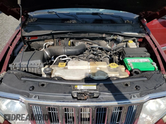 2012 Jeep Liberty Sport with VIN 1C4PJMAK0CW182156, listed as a Copart auction lot 66534525 with 128,133 mi miles and Clean title. Bid and sale history available at DreamBid. Image 12.
