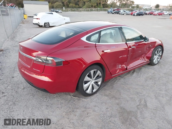 2020 Tesla Model S Long Range with VIN 5YJSA1E26LF390856, listed as a IAAI auction lot 41013728 with 54,985 mi miles. Bid and sale history available at carsss.com. Image 4.