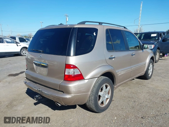 2002 Mercedes-Benz M 320/430/500 with VIN 4JGAB75E42A322824, listed as a IAAI auction lot 41871249 with 203,845 mi miles and . Bid and sale history available at carsss.com. Image 4.